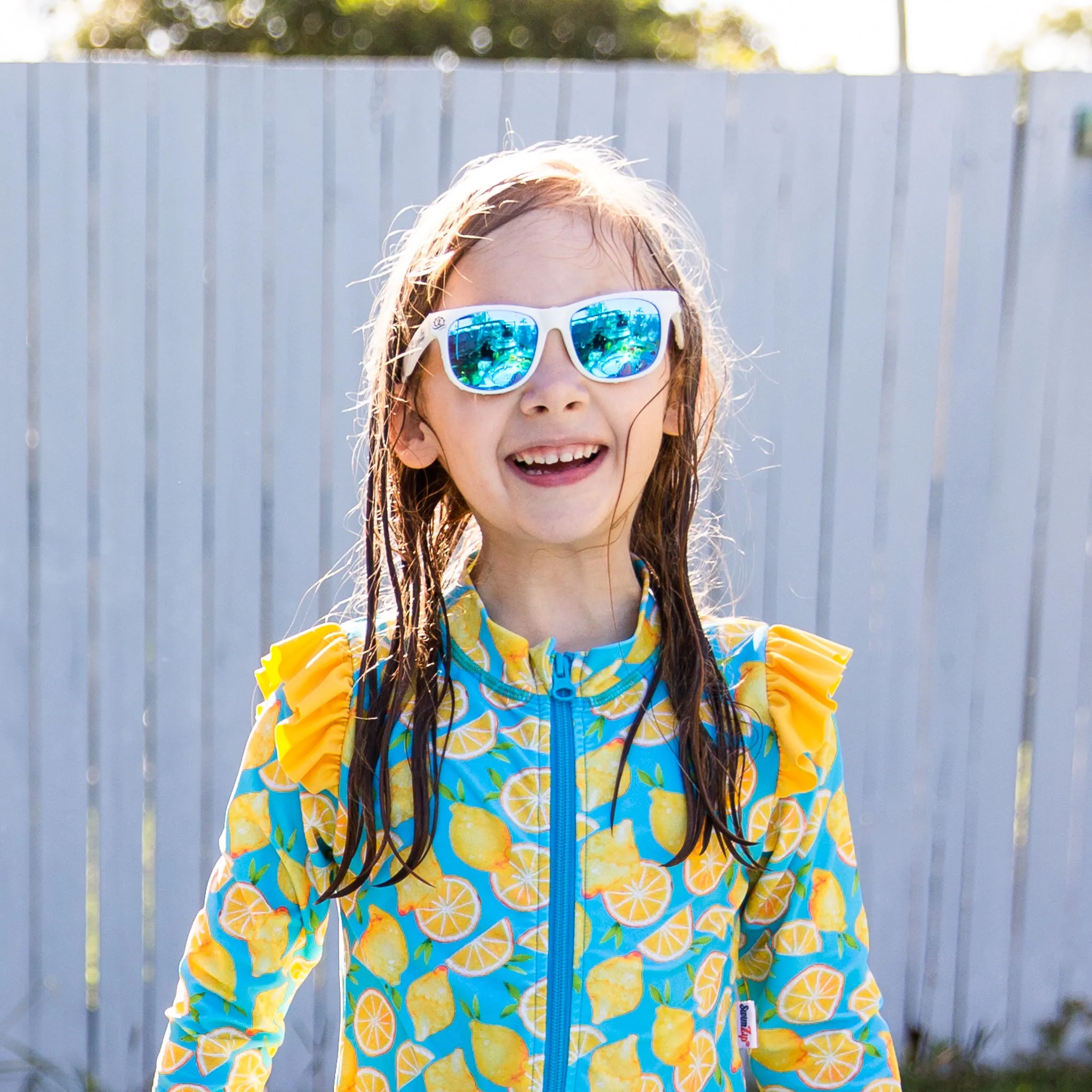 Girls Long Sleeve Rash Guard Ruffle Bottom Swimsuit Set (2 Piece) | "Lemons"